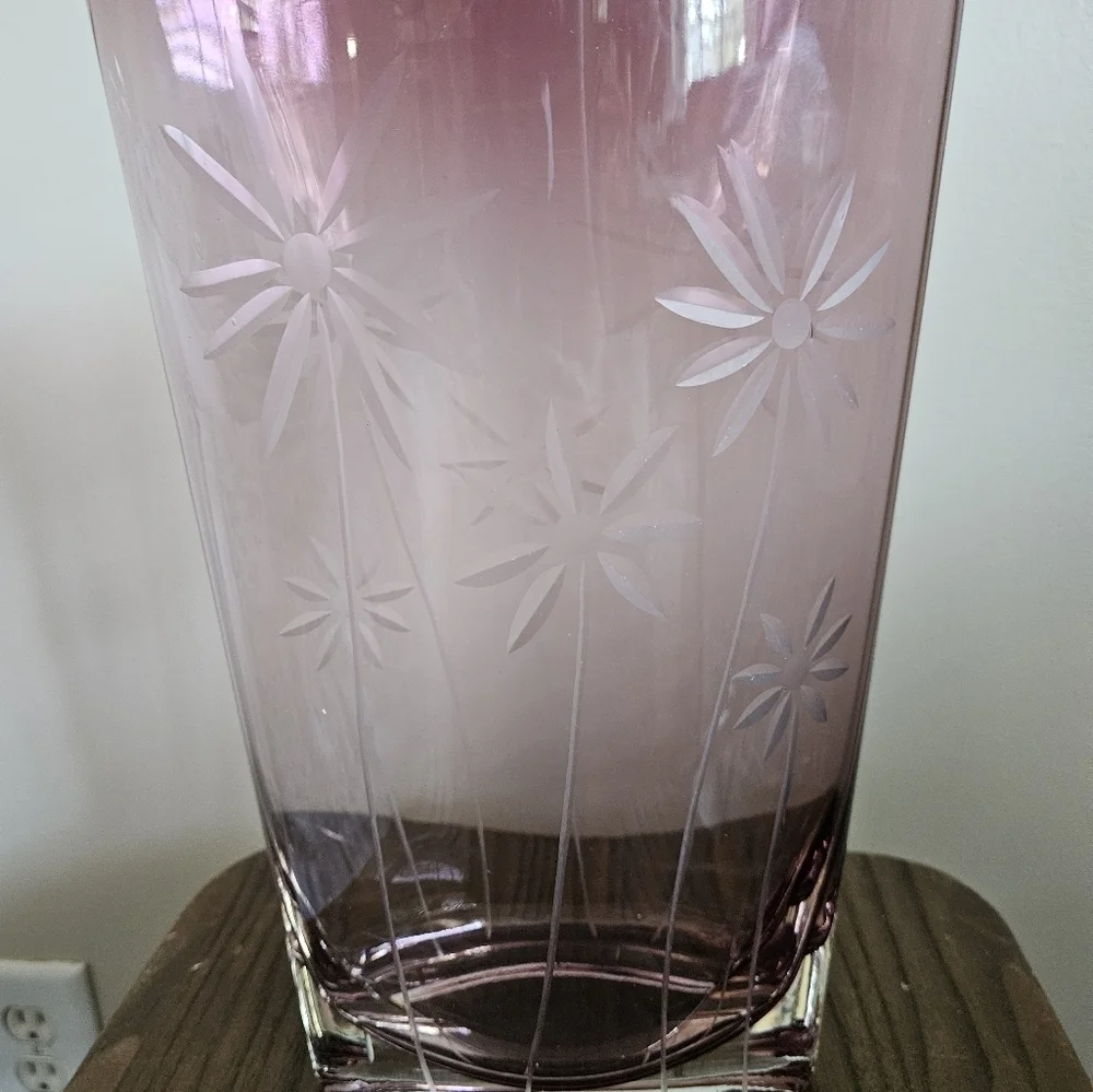 Elegant oval clear cut purple vase.